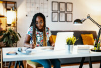 African American female student studying from home during lockdown