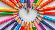 set of coloring pencils forming heart