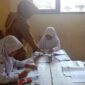 Zuana Turrosyidah S.Pd.I/Guru di SDN 1 Mojoagung