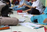 Foto: Ilustrasi peserta didik sedang mengerjakan LKPD mewarnai/naikpangkat.com